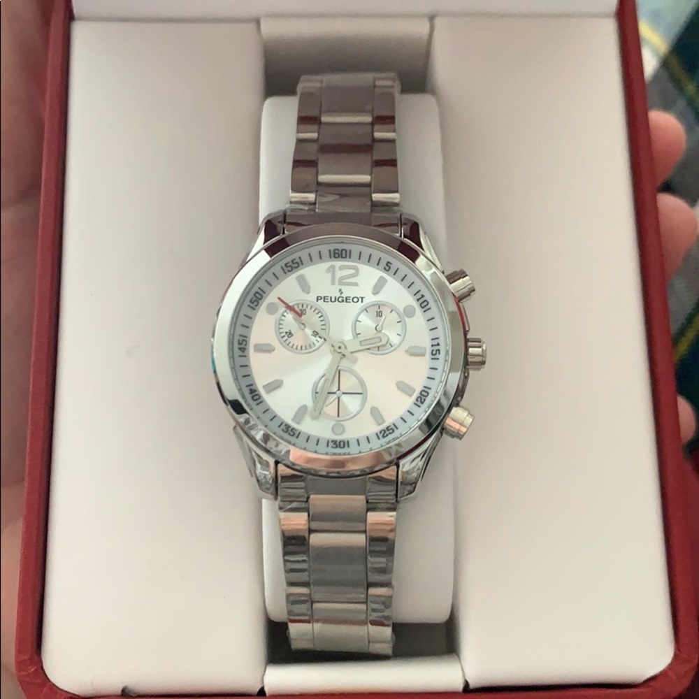 Brand new Silver Peugeot watch